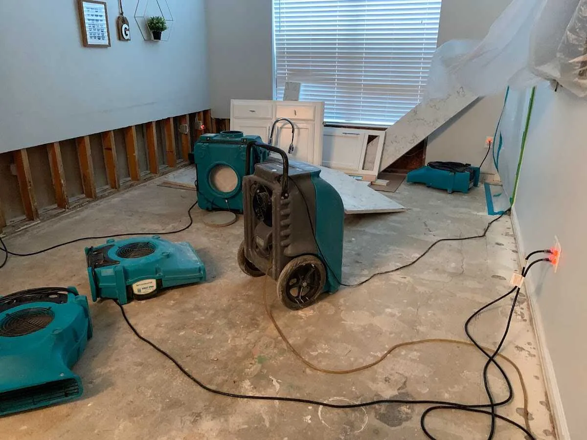Dehumidifier in flood-cut room for Water Damage Restoration in Pembroke